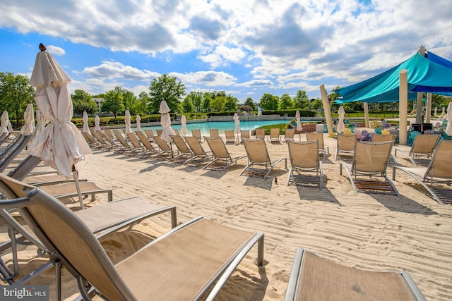 view of patio featuring a community pool