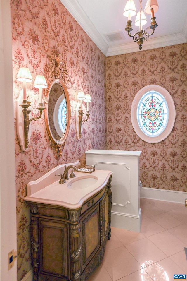 bathroom featuring an inviting chandelier, vanity, tile flooring, and ornamental molding