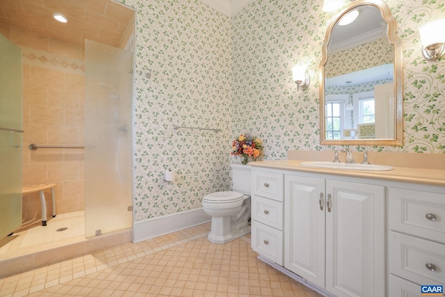 bathroom with oversized vanity, toilet, ornamental molding, and tile floors