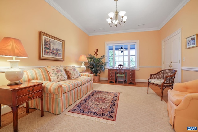 living room with ornamental molding, a chandelier, and light hardwood / wood-style floors