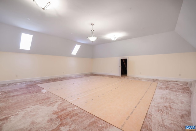 bonus room featuring vaulted ceiling