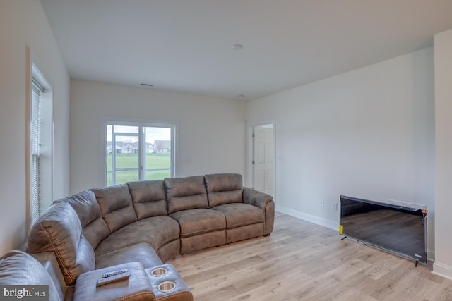 living room featuring light hardwood / wood-style floors