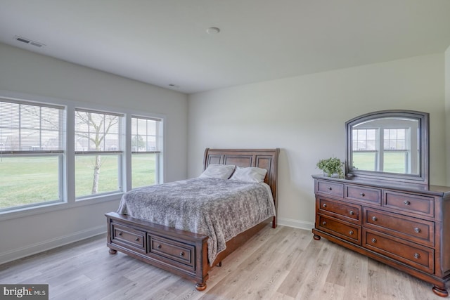 bedroom featuring light hardwood / wood-style floors