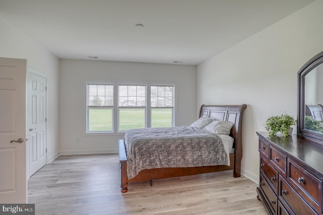 bedroom featuring light wood-type flooring