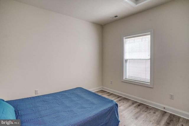 bedroom featuring light hardwood / wood-style flooring