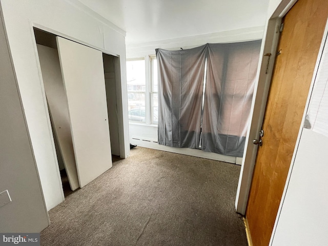 unfurnished bedroom with carpet