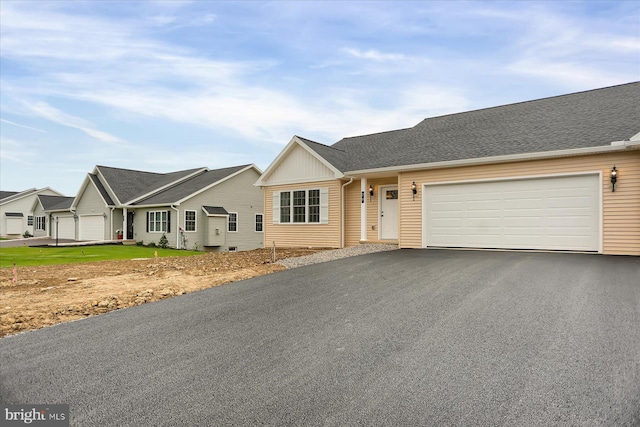 single story home featuring a garage