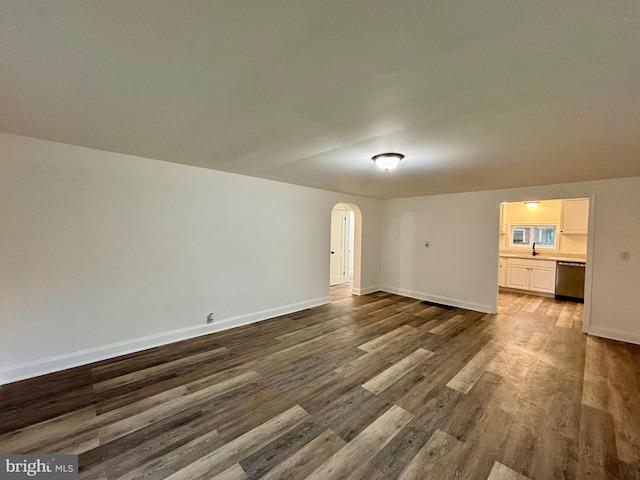 spare room with dark hardwood / wood-style floors