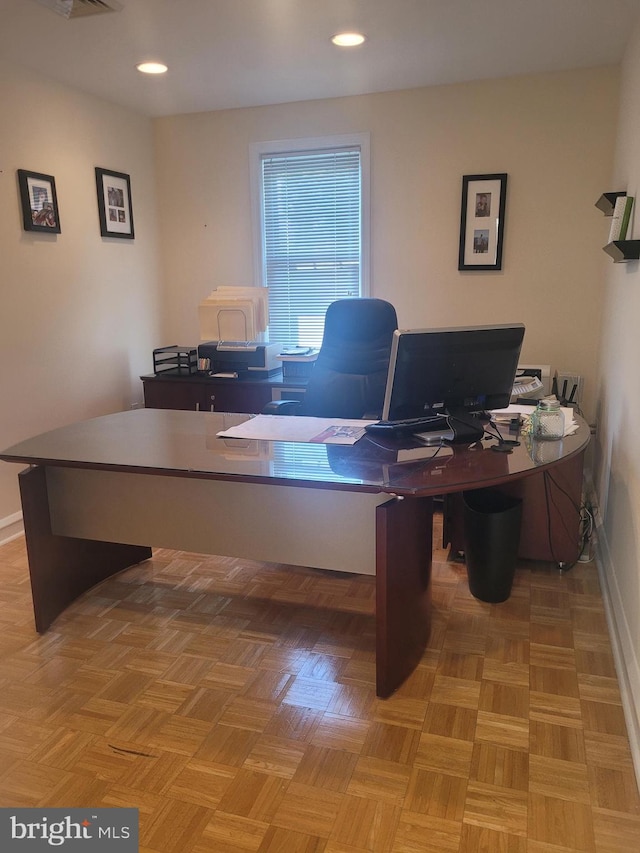 office area featuring parquet flooring