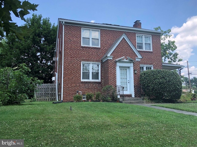 view of front of home with a front yard