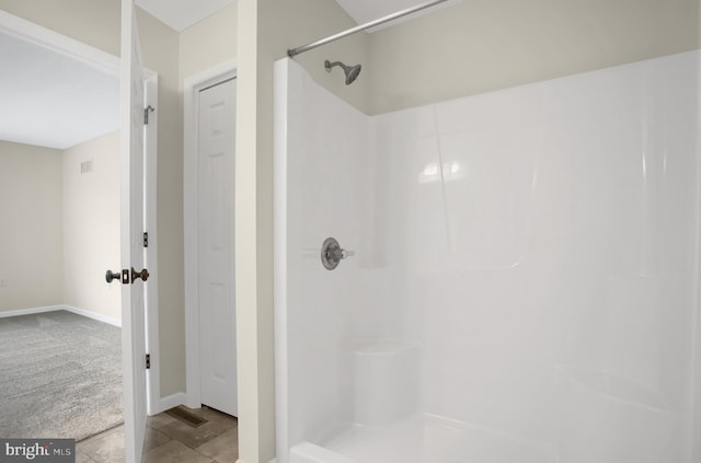 bathroom with a shower