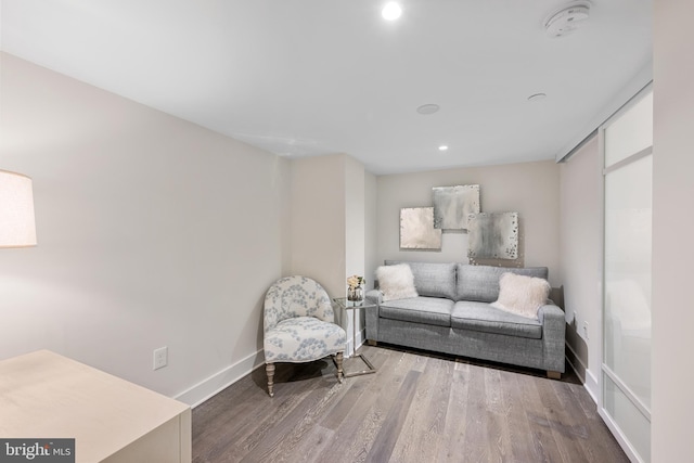 living area with light hardwood / wood-style flooring