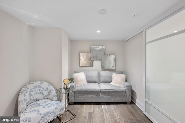 sitting room featuring hardwood / wood-style flooring