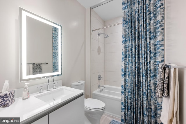 full bathroom featuring toilet, shower / tub combo with curtain, vanity, and tile flooring