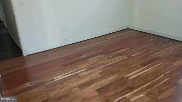 details with dark wood-type flooring