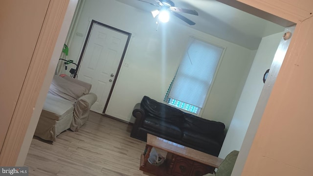 interior space with ceiling fan and light wood-type flooring