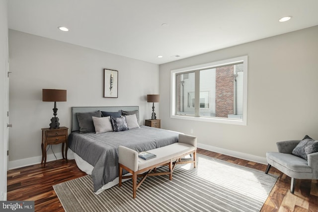 bedroom featuring dark wood-type flooring