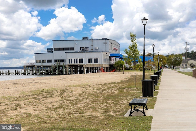 view of building exterior with a water view