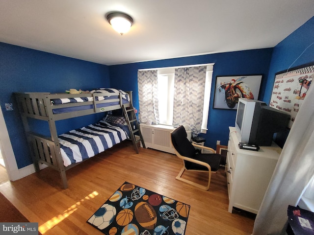 bedroom with light wood-type flooring