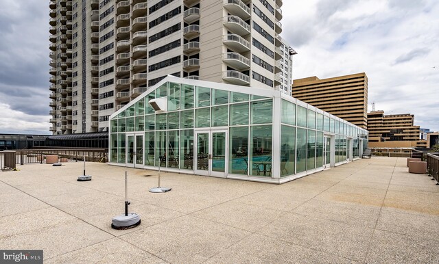 view of building exterior featuring fence