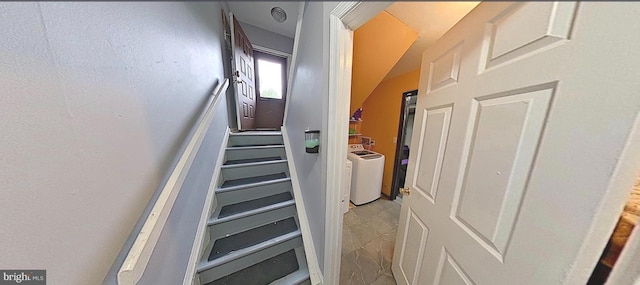 stairway with washer and dryer