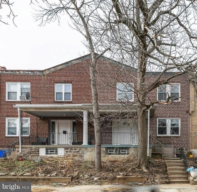 multi unit property featuring covered porch