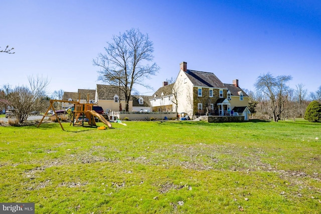 view of yard featuring a playground