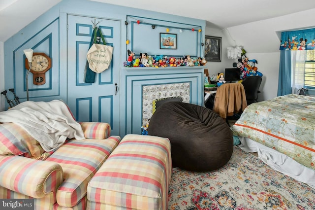 bedroom featuring lofted ceiling