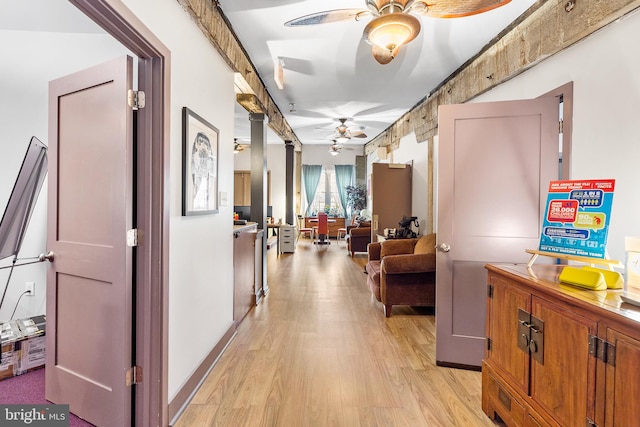 hallway with light wood-type flooring