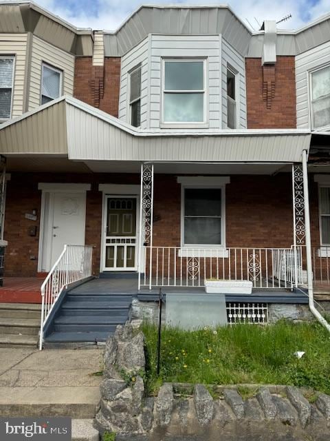 view of front of home featuring covered porch