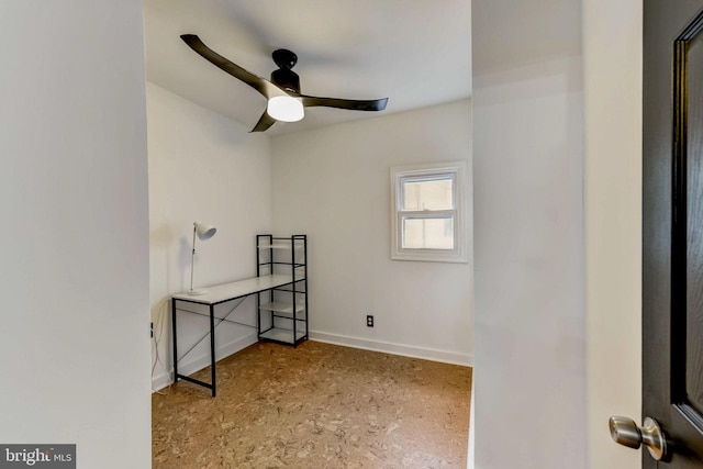 spare room featuring ceiling fan