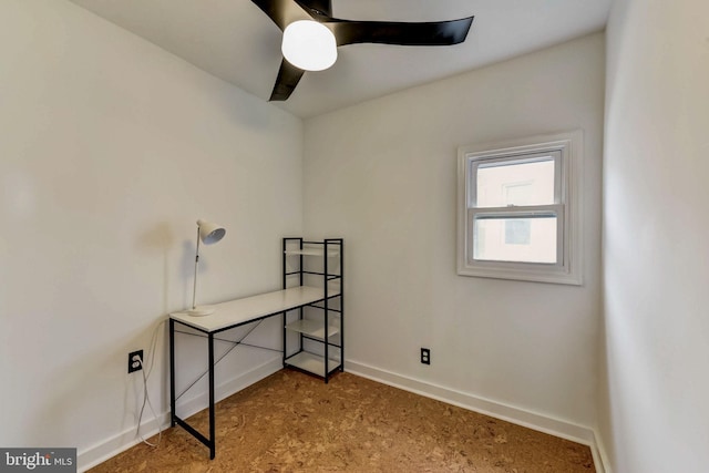 unfurnished room with ceiling fan