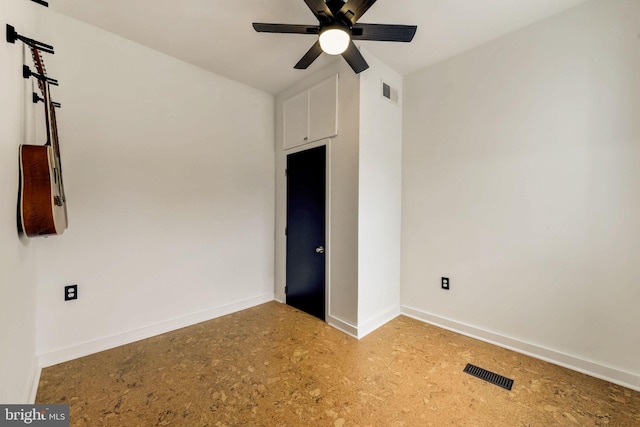 unfurnished room featuring ceiling fan