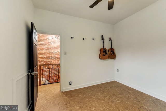 carpeted empty room with ceiling fan