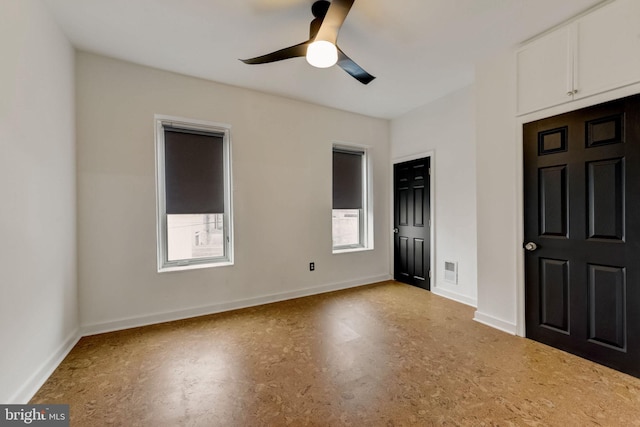 unfurnished bedroom with ceiling fan