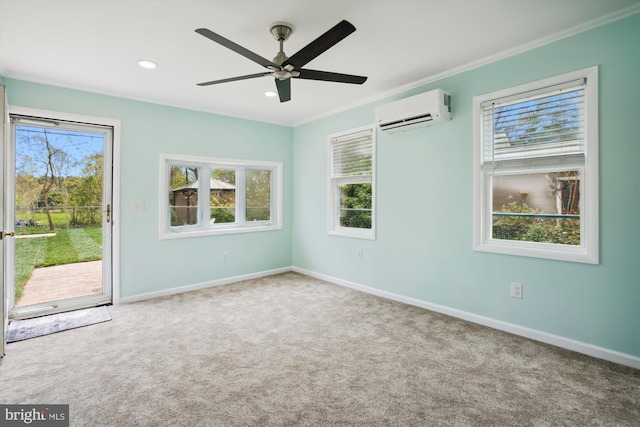 empty room with ceiling fan, a healthy amount of sunlight, carpet floors, and a wall mounted AC