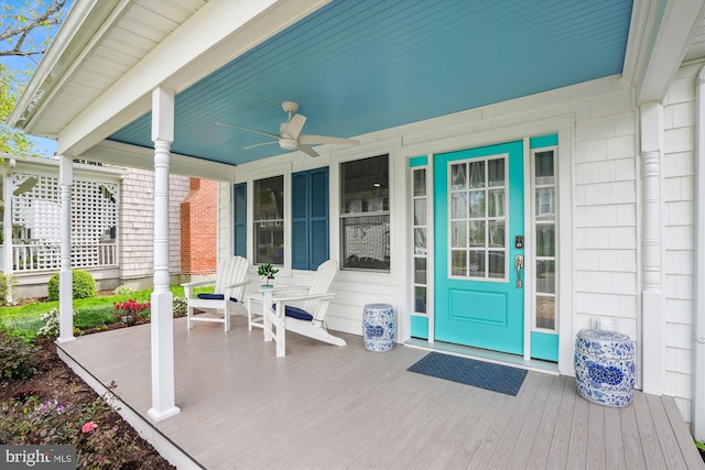 exterior space featuring ceiling fan and covered porch