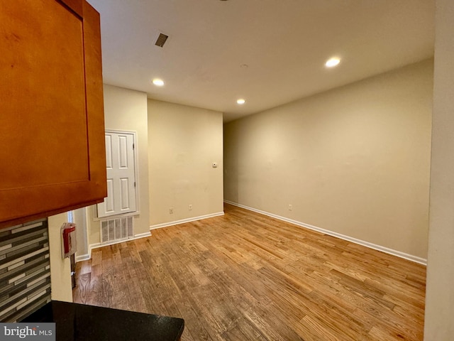 empty room with light wood-type flooring