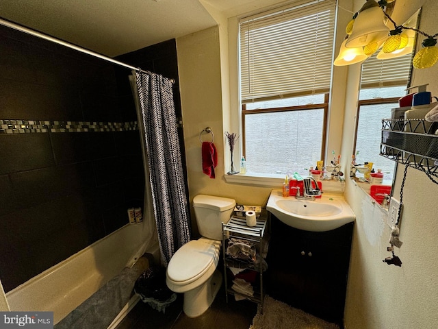 full bathroom with vanity, toilet, and shower / bathtub combination with curtain