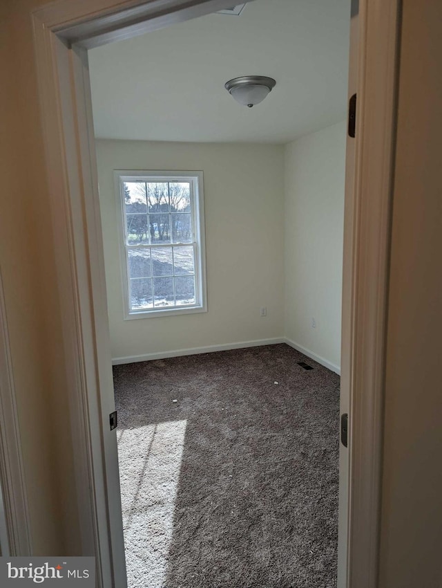 view of carpeted spare room