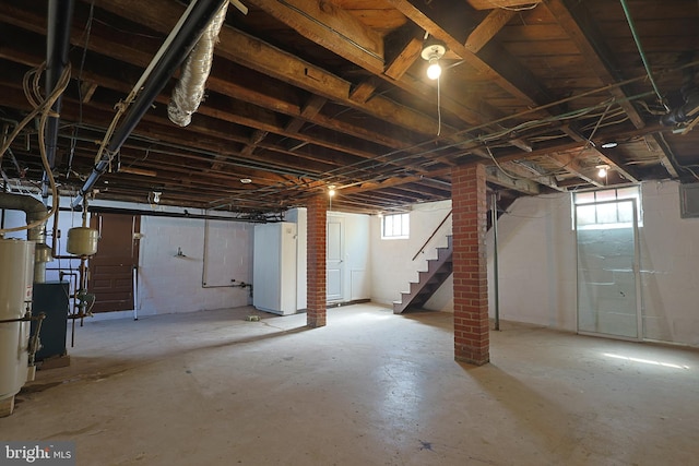 basement with brick wall