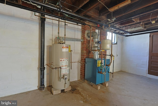 basement featuring brick wall and gas water heater