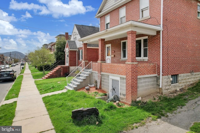 view of side of property featuring a garage