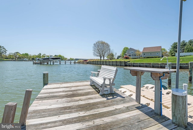 view of dock with a water view