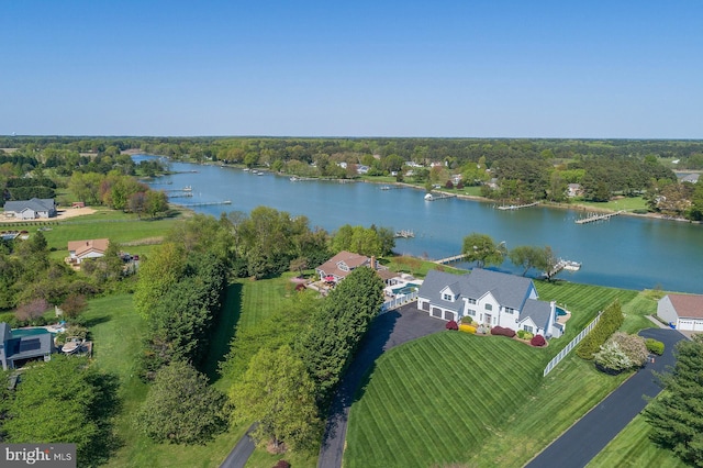 aerial view with a rural view and a water view