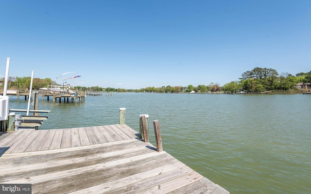 view of dock with a water view