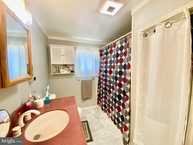 bathroom featuring tile flooring, ornamental molding, and oversized vanity