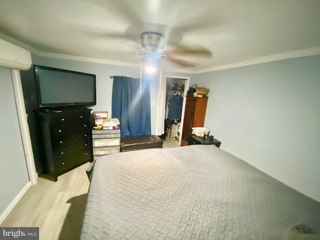 bedroom featuring ceiling fan and crown molding