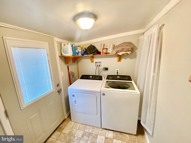 clothes washing area featuring washer and dryer, washer hookup, and light tile floors