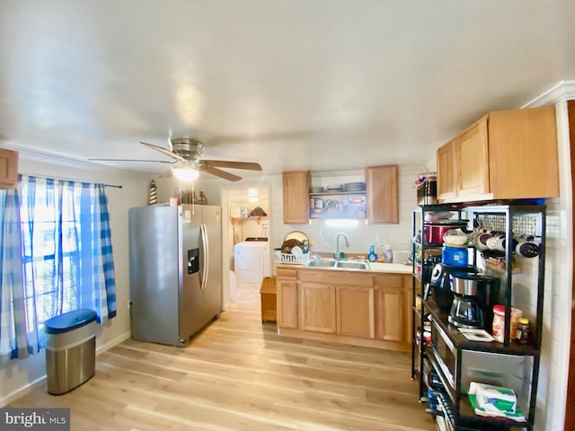 kitchen featuring stainless steel fridge with ice dispenser, ceiling fan, sink, and light hardwood / wood-style flooring